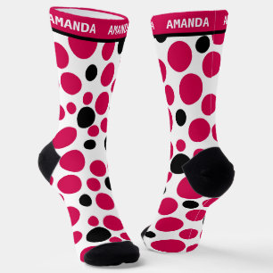 Chaussette pois noir rouge rétro sur arrière - plan blanc