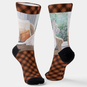 Chaussette Westie regardant par une fenêtre