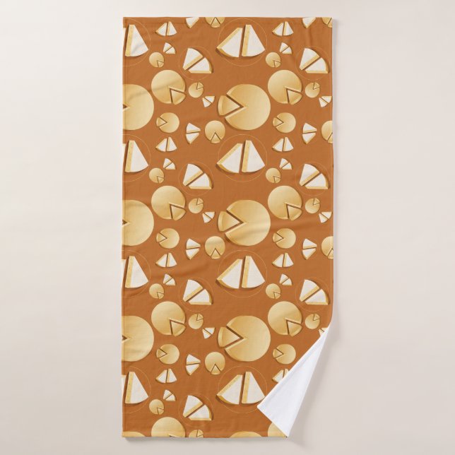 Cheese wheels and slices on a burnt orange (Serviette de bain)
