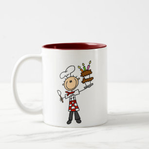 Chef avec la tasse de gâteau d'anniversaire