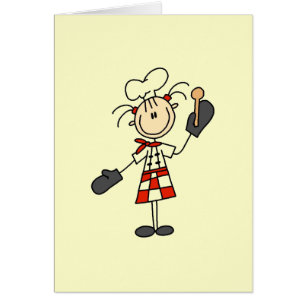 Chef féminin avec les gants et la cuillère en bois