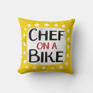 Chef Sur Un Oreiller À Vélo