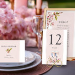 Cherry Blossom Wedding Reception Tischnummer<br><div class="desc">Cherry Blossom Hochzeit Tischnummer mit optionalem Sondertext. Ein schönes, weiches, rosa und weißes Design, verziert mit zarter Kirschblüte und Champagnerbrille, die Ihrem Fest ein anmutiges und botanisches Ambiente verleihen. Das Design Set den Ton für einen romantischen und unvergesslichen Tag, der die zeitlose Schönheit des Frühlings mit seinen sanften rosa Blume...</div>