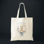 Chic Blue Bow Spring Floral Bunny Tragetasche<br><div class="desc">This personalized tote bag features a charming watercolor bunny surrounded by delicate spring florals and finished with a soft blue bow. The gentle pastel palette creates a light, elegant design that feels perfect for Easter celebrations while still being beautiful enough to carry all year long. Add a name to create...</div>