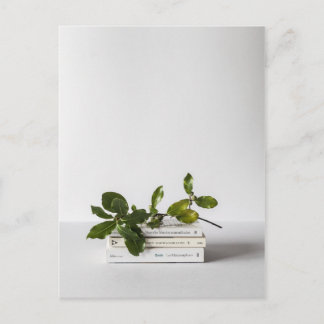 chic minimal pile of books botanical literary postkarte