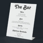 Chic Retro Vintage Wedding Drinks Bar Menu Sockelschild<br><div class="desc">Die Bar ist offen! Chic Wedding Bar Menu Sign mit Retro inspiriert Typografie und einer Touch Vintag - ein trendiges Schwarz-Weiß-Getränkemenü für Ihre Hochzeit oder jede andere Feier. Einfach in Ihr eigenes Getränkekarte eintragen - alle Farben (Hintergrund und Textfarbe) können auf Ihr Hochzeitsmotiv oder Party angepasst werden.</div>