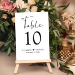 Chic Script Wedding Reception Tischnummer<br><div class="desc">Chic Hochzeitsempfangsschild mit "Tisch" in einem modernen,  stilvollen Drehbuch,  die Tischnummer in klassischer Serifentypografie,  Ihre Namen durch ein Herz und Ihr Empfang Datum verbunden. Erstellen Sie jedes Tischnummer-Zeichen und fügen Sie Ihren Warenkorb ein nach dem anderen,  dann Karo aus,  sobald alle Zahlen in Ihrem Warenkorb sind.</div>