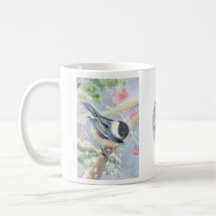 Chickadee et tasse de baies