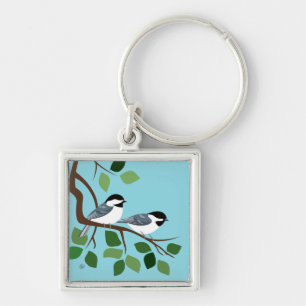 Chickadees an der Zweigstelle des Baumes Schlüsselanhänger