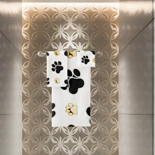 Chien canin noir et tan empreinte de patte blanc