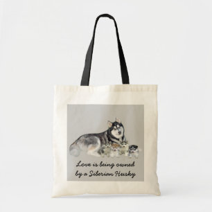 Chien de traîneau sibérien et sac fourre-tout à