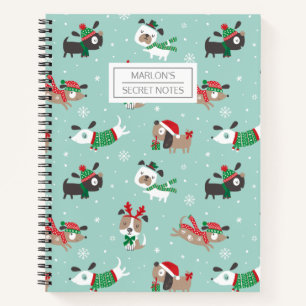 Chiens de noël mignons sur carnet bleu clair