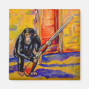 Chimp avec un aimant à pistolet