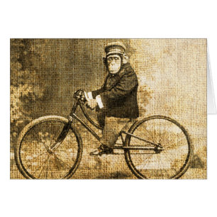 Chimpanzé vintage sur une bicyclette