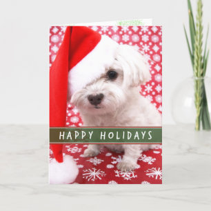 Chiot avec la carte de Noël de Santa Hat