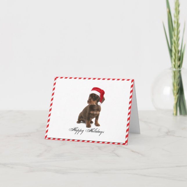 Chiot de Daschund dans la carte de Noël de (Devant)