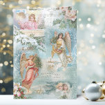 Choir of Vintage Weihnachts-Angels Collage Feiertagskarte<br><div class="desc">Charmante Collage aus Viktorianischen Engeln,  schneebedeckten Kiefern,  Rose,  Heiligenmusik,  Weihnachtsmusik,  Typografie,  Evergreens und rustikalen Landschaften,  umgeben von zarten weißen Filigree auf hellblauem Hintergrund.</div>