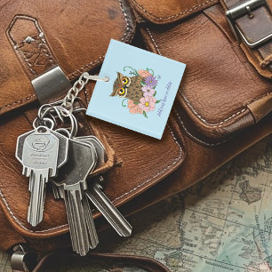 Chouette aux fleurs pastel de printemps