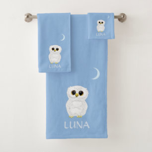 Chouette blanche et lune de croissant sur le bleu