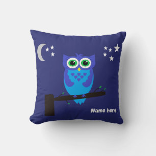 Chouette bleue sur un coussin bleu