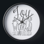 Christliche Freude an den Weihnachten der Welt Uhr<br><div class="desc">Diese einzigartige Uhr zeigt die wichtigste Botschaft von Weihnachten: "Joy to the World, the Lord has come!" in handgeschriebenem Stil! Variationen dieses Designs, zusätzliche Farben sowie koordinierende Produkte sind in unserem Shop, zazzle.com/store/doodlelulu verfügbar. Kontaktieren Sie uns, wenn Sie dieses Design für ein bestimmtes Produkt verwenden möchten, um Ihr eigenes, einzigartiges...</div>