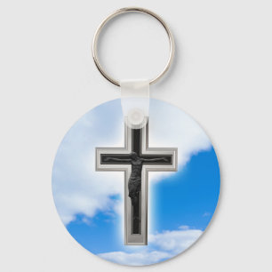 Christliches Kreuz im blauen Himmelshintergrund Schlüsselanhänger