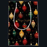 Christmas Bauble Ornament Bright Mittlere Geschenktüte<br><div class="desc">Eine farbenfrohe Weihnachtsgeschenktasche,  mit einem Design von glänzenden Baum-Ornamenten in leuchtenden Farben von goldrot und blau,  alles auf einem schwarzen Hintergrund. Die Formulierung "Frohe Weihnachten" in goldfarbenem Schriftart kann mit jedem Gruß nach Bedarf angepasst werden oder personalisieren mit einem Namen.</div>