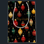 Christmas Bauble Ornament Bright Mittlere Geschenktüte<br><div class="desc">Eine farbenfrohe Weihnachtsgeschenktasche,  mit einem Design von glänzenden Baum-Ornamenten in leuchtenden Farben von goldrot und blau,  alles auf einem schwarzen Hintergrund. Die Formulierung "Frohe Weihnachten" in goldfarbenem Schriftart kann mit jedem Gruß nach Bedarf angepasst werden oder personalisieren mit einem Namen.</div>