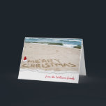 Christmas beach with surf feiertagskarte<br><div class="desc">Merry Christmas in beach sand with Santa hat.</div>