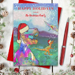 Christmas Dinosaur T-Rex Santa Feiertagskarte<br><div class="desc">Zeit für Weihnachten Dinosaurier Spaß mit dieser Schneeszene und eine beängstigende bunte T-Rex in einer Weihnachtsmannmütze mit einem Velociraptor und einem fliegenden pterodactyl in Weihnachtsmannmützen. Fügen Sie Ihren Familiennamen hinzu und wünschen Ihren Freunden einen unterhaltsamen prähistorischen Dinosaurier glücklichen Urlaub. Vergewissern Sie sich besser, dass Sie nicht unartig, sondern nett sind,...</div>