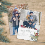 Christmas Elegant Winter Holly Berries 2 Photo Feiertagskarte<br><div class="desc">This design features Christmas holiday red holly berries, with photo 2 two family picture layout, botanical greenery winter foliage, a watercolor red green blue silver, elegant pine branch twig branches, classic traditional eucalyptus leaves, and-lettered script calligraphy, with modern calligraphy script font, modern elegant simple trendy, a lovely multi photo collage...</div>