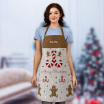 Christmas Gingerbread Man & Candy Cane Schürze<br><div class="desc">Eine Weihnachtsfeier mit Süßspeisen und Lebkuchenmännern für diejenigen,  die Liebe,  zu backen oder verbringen Zeit in der Küche,  um ein gutes Essen für Weihnachten. Es wird mit zwei anpassbaren Texten geliefert,  wenn du will,  es anzubieten,  oder es einfach für dich zu bekommen!</div>