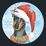 Christmas Manchester Terrier Runder Aufkleber<br><div class="desc">Feiern Sie die Urlaubssaison mit einem niedlichen Manchester Terrier mit Weihnachtsmannmütze und Schal. Eine tolle Geschenkidee für die Familie und Freunde von Manchester. Gute Ferien!</div>