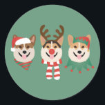 Christmas Pembroke Welsh Corgi Hunde Runder Aufkleber<br><div class="desc">Niedliche Abbildung von Pembroke Walisisch Corgi Hunden in Weihnachtsbekleidung. Ideal für Liebhaber von Haustieren oder Eltern während der Ferienzeit.</div>