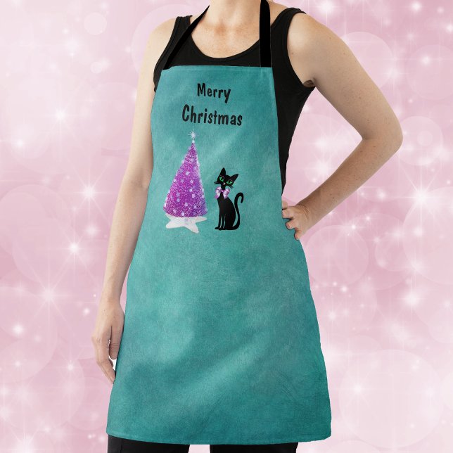 Christmas Pink Silver Tree Star Rug Black Cat Teal Schürze (Pink silver tree on star rug with black cat wearing pink bow on teal Christmas kitchen apron.)