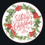Christmas Red Green Wreath Holly Ivy Typografie Runder Aufkleber<br><div class="desc">Niedlicher Weihnachtskranz aus heiligen und eisigen Blätter. Rote Beeren und grüne Blätter,  traditionelles Weihnachtsdesign. Weiße Schneeflocken und roter Rahmen. Extravagante Wirble kursive handgeschriebene Frohe Weihnachten.</div>