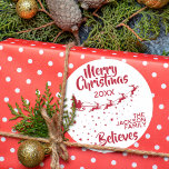 Christmas Santa's sleigh reindeers holiday Runder Aufkleber<br><div class="desc">Show how much you believe in the magic of Christmas and Santa Claus with this Christmas family round sticker featuring the silhouette of Santa's sleigh in red with his reindeers, flying in a trail of stars. The caption on top reads Merry Christmas in festive red handwritten lettering. The text, in...</div>
