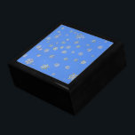 CHRISTMAS SNOWFLAKES GESCHENKBOX<br><div class="desc">Hübsche kleine Schneeflocken vor einem hellblauen Hintergrund. Ein ideales Design für die Weihnachtszeit. England.</div>