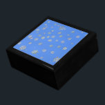 CHRISTMAS SNOWFLAKES GESCHENKBOX<br><div class="desc">Hübsche kleine Schneeflocken vor einem hellblauen Hintergrund. Ein ideales Design für die Weihnachtszeit. England.</div>