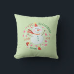 Christmas Snowman Hugs Liebe Kisses Green Kissen<br><div class="desc">Dieses Kissen bietet einen niedlichen Weihnachtsschneemann mit einer fröhlichen Weihnachtsbotschaft.</div>