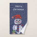 Christmas Snowman Lights Snow Hat Scarf Dark Blue Handtuch<br><div class="desc">Dieses Handtuch für Ihr Bad ist dunkelblau mit einem glücklichen Snowman,  der einen Winterhut trägt und einen Schal mit einer leuchtenden Reihe von bunten Weihnachtslichtern mit fallendem Schnee trägt. Passen Sie den frohen Weihnachtstext oben mit Vorlage an.</div>