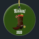 Christmas Western Cowboy Personalized Boot Keramik Ornament<br><div class="desc">This design was created though digital art. It may be personalized in the area provided or customizing by changing the photo or added your own words. Contact me at colorflowcreations@gmail.com if you with to have this design on another product. Purchase my original abstract acrylic painting for sale at www.etsy.com/shop/colorflowart. See...</div>