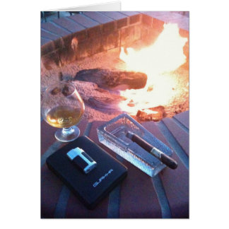 Cigare et une boisson par le feu