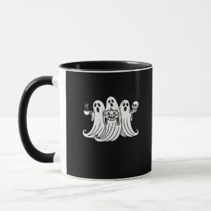 Citrouille tenant une tasse de café effrayant