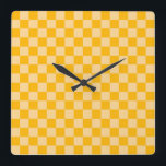Citrus cream checkered board pattern quadratische wanduhr<br><div class="desc">A vibrant orange and beige checkerboard pattern with alternating bright and muted squares,  creating a lively and symmetrical design with a warm,  energetic tone.</div>