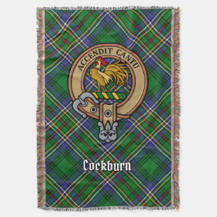 Clan Cockburn-Wappen über Tartan Decke