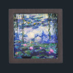 Claude Monet-Wasser-Lilien Schachtel<br><div class="desc">Meisterwerk der feinen Kunst durch Claude Monet (1840 - 1926) seine populären Landschaftsmalerei Wasser-Lilien kennzeichnend basiert auf Schatten von Blauem, von Grünem und von Lila. Sie stellt ein würdevolles Schmuckkästchen für Fans von Claude Monet, von Impressionismus und von wirklicher schöner Kunst her.</div>