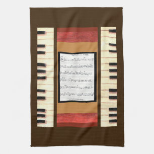 Clés de piano bordure feuille musique serviette de