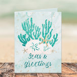 Coastal Beach SEAS & GREETINGS Turquoise Glitter Feiertagskarte<br><div class="desc">Coastal, beach or tropical Christmas holiday card featuring the greeting SEAS AND GREETINGS in modern calligraphy script typography in turquoise, aqua and teal watercolor with coral, starfish and sand dollars accented with faux glitter and your custom text inside. OPTIONS: The sample is shown on the 4x5.6" satin card--5x7 or matte...</div>