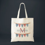 Coastal Nautical Beach Flags Monogram Tragetasche<br><div class="desc">This monogrammed cotton tote bag features nautical flag banners in soft watercolor shades of red,  white and blue.  Personalize the monogram on the front with your choice of name and initial and the back with your choice of special text.  Fun for personalized party favors and gift bags.</div>